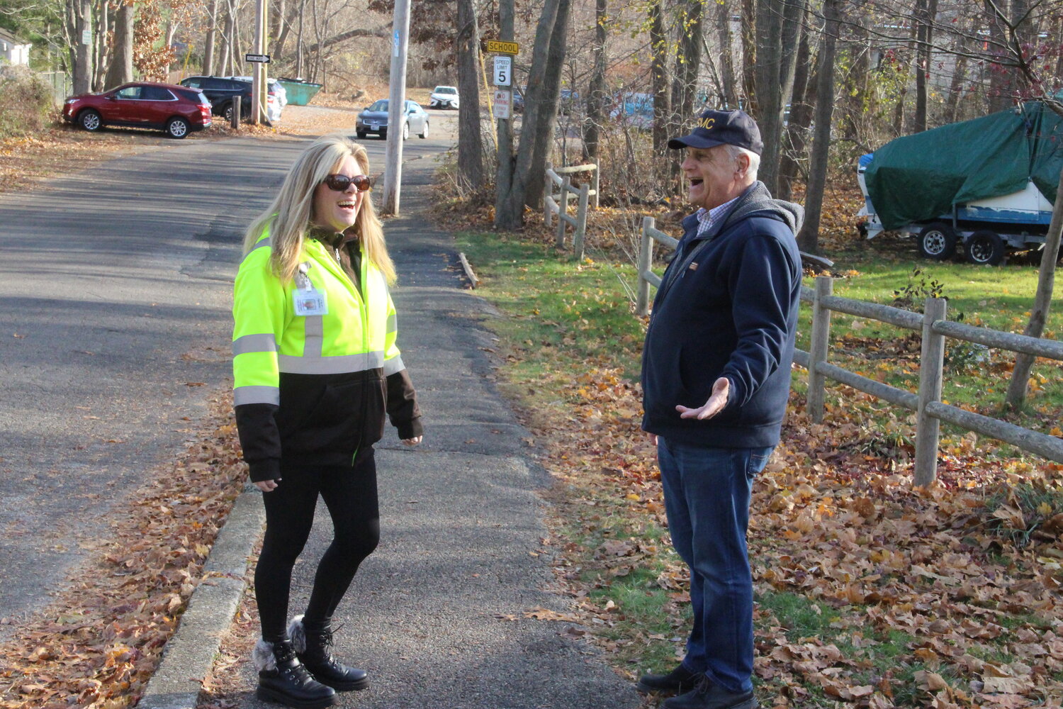 IT COULD USE SOME HELP, TOO: Crossing guard Robyn DeFelice and Councilman Ladouceur have issues with the sidewalk leading to the school’s entrance on Lenox Avenue. A broken section of the walk was recently leveled with cold patch, but in spots it’s still pretty rough.